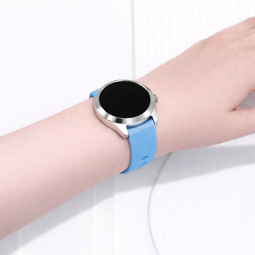 Garmin Vivoactive 4S smartwatch worn on the wrist with a light blue silicone watch strap and silver case