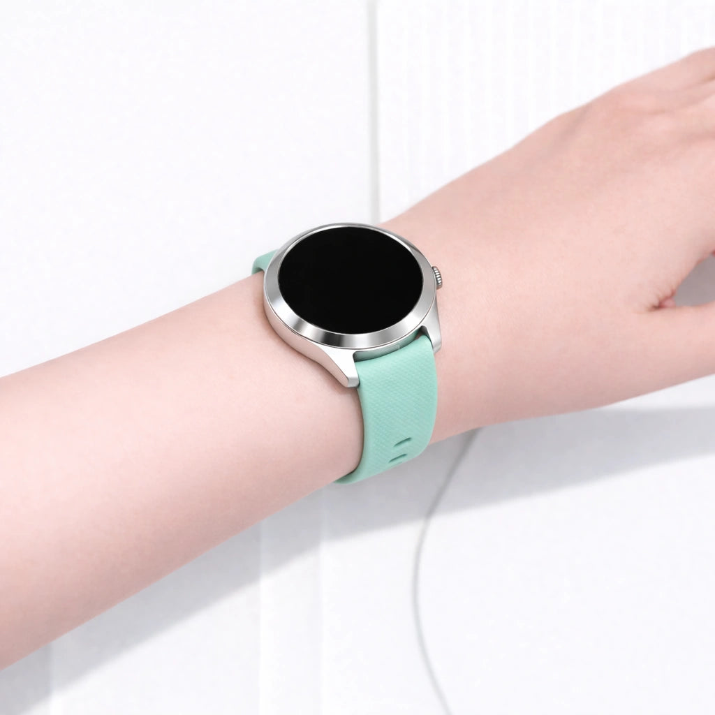 Garmin Vivoactive 4S smartwatch worn on the wrist with a mint green silicone watch strap and silver case