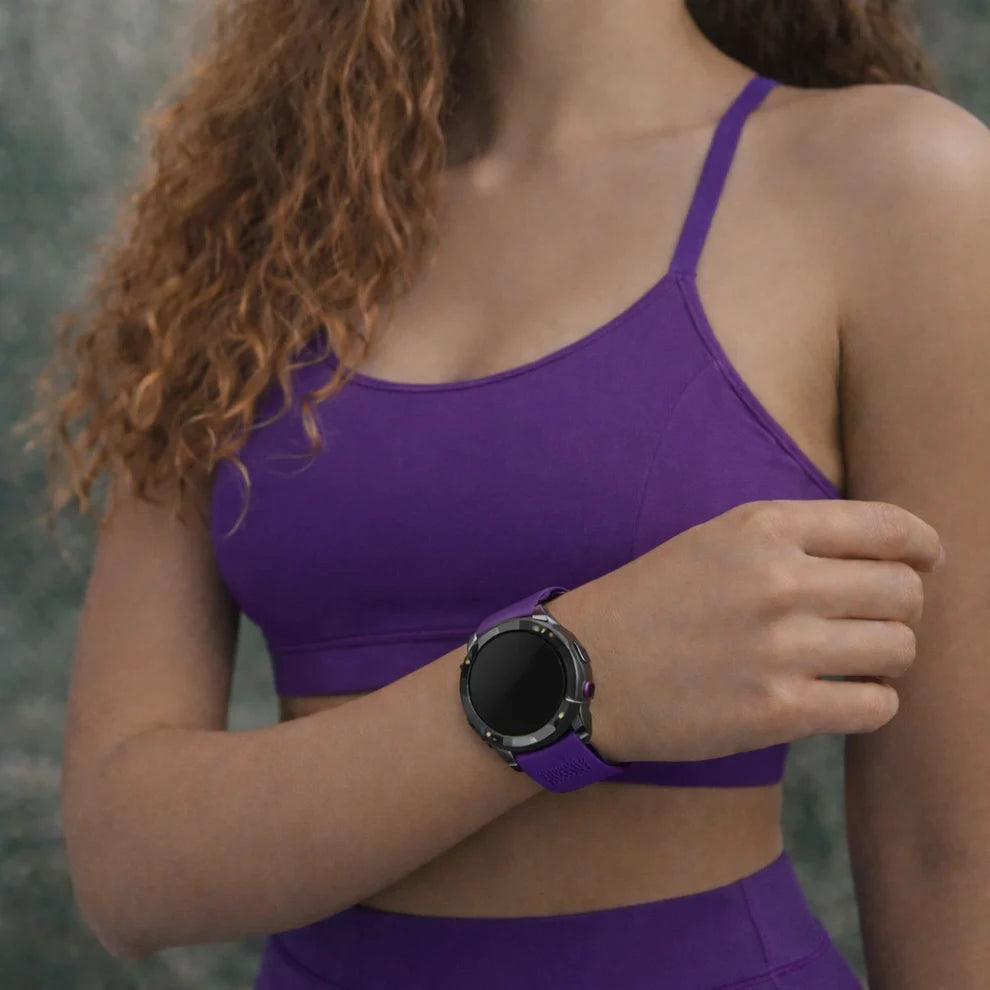 Purple Garmin Fenix 8 strap worn during fitness training with matching activewear