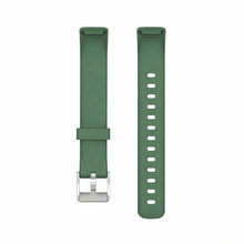 Green silicone watch strap compatible with Fitbit Luxe shown against white background