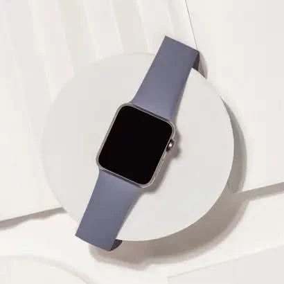 Grey strap for Apple Watch SE made from flexible silicone, perfect for daily wear.