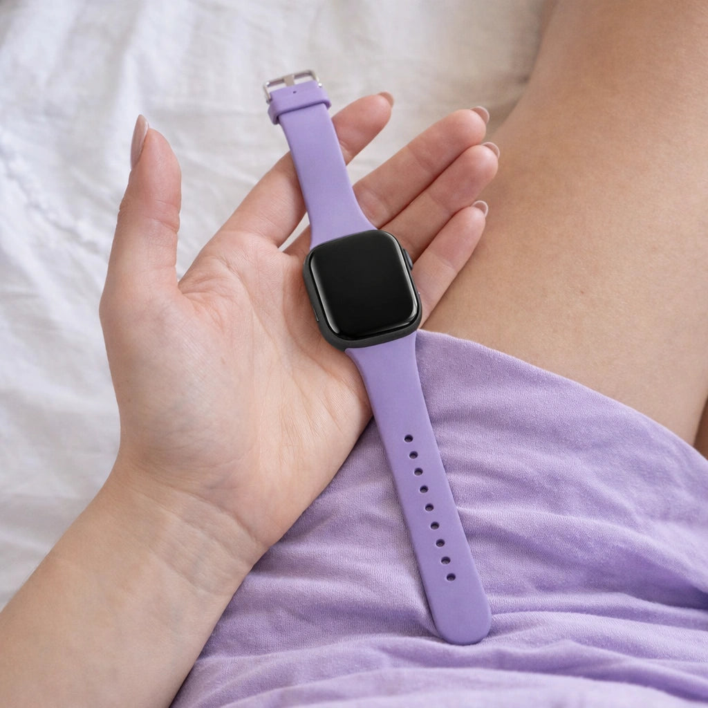 Close-up of light purple Fitbit Sense 2 watch strap in a casual setting
