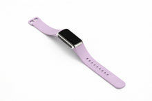 Light purple silicone strap designed to fit the Fitbit Charge 6