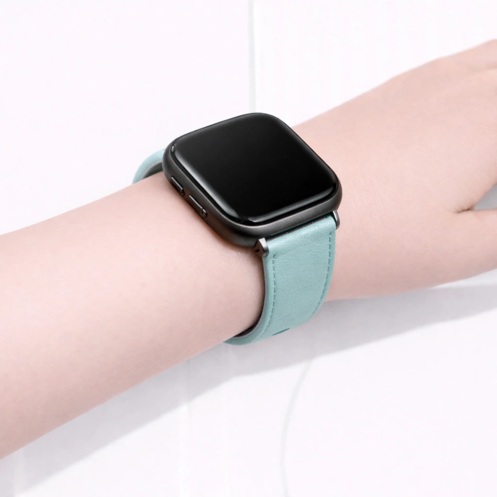 Mint leather wristband for Fitbit Versa 2 worn on the wrist with a comfortable, snug fit