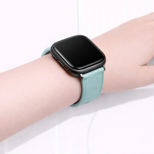 Mint leather wristband for Fitbit Versa 2 worn on the wrist with a comfortable, snug fit