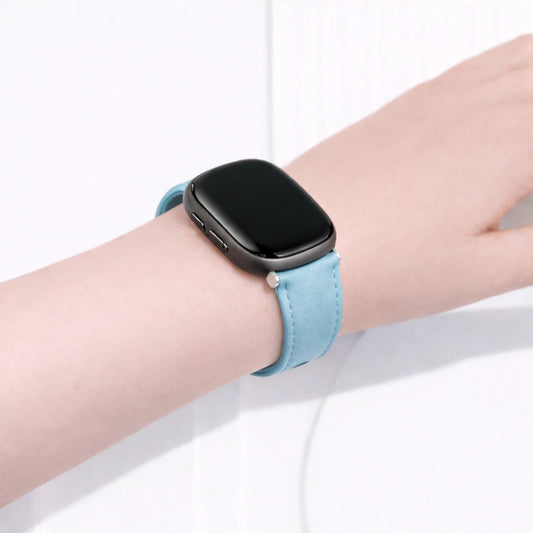 Mint leather band worn on the wrist, designed for a comfortable and secure Fitbit Versa 3 fit