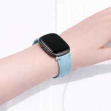 Mint leather band worn on the wrist, designed for a comfortable and secure Fitbit Versa 3 fit