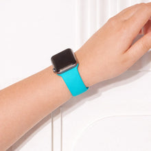 Mint silicone Apple Watch band worn on wrist with soft flexible fit