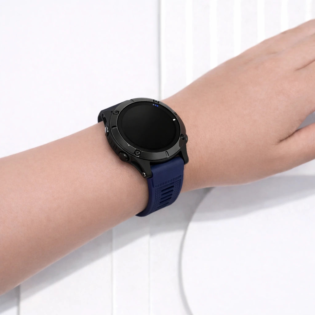 Close-up of Garmin Forerunner 955 strap in navy blue showing smooth and flexible silicone