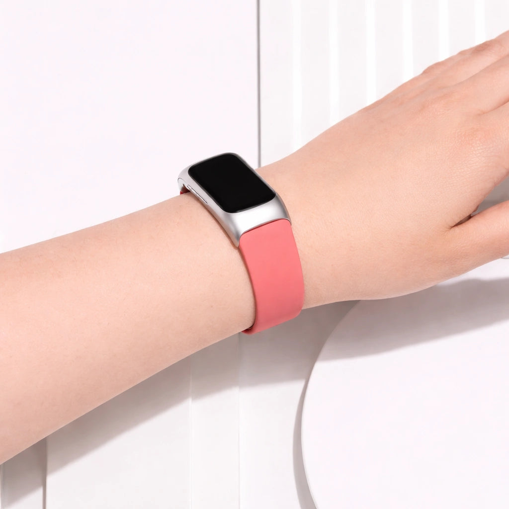 Official red watch strap for Fitbit Charge 6 worn on the wrist