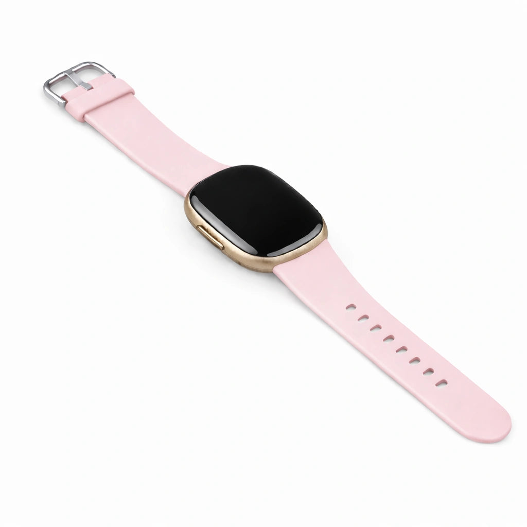 Light pink silicone watch strap compatible with Fitbit Versa 3 on a white background.