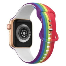 Rear view of Apple Watch with rainbow silicone strap and white interior