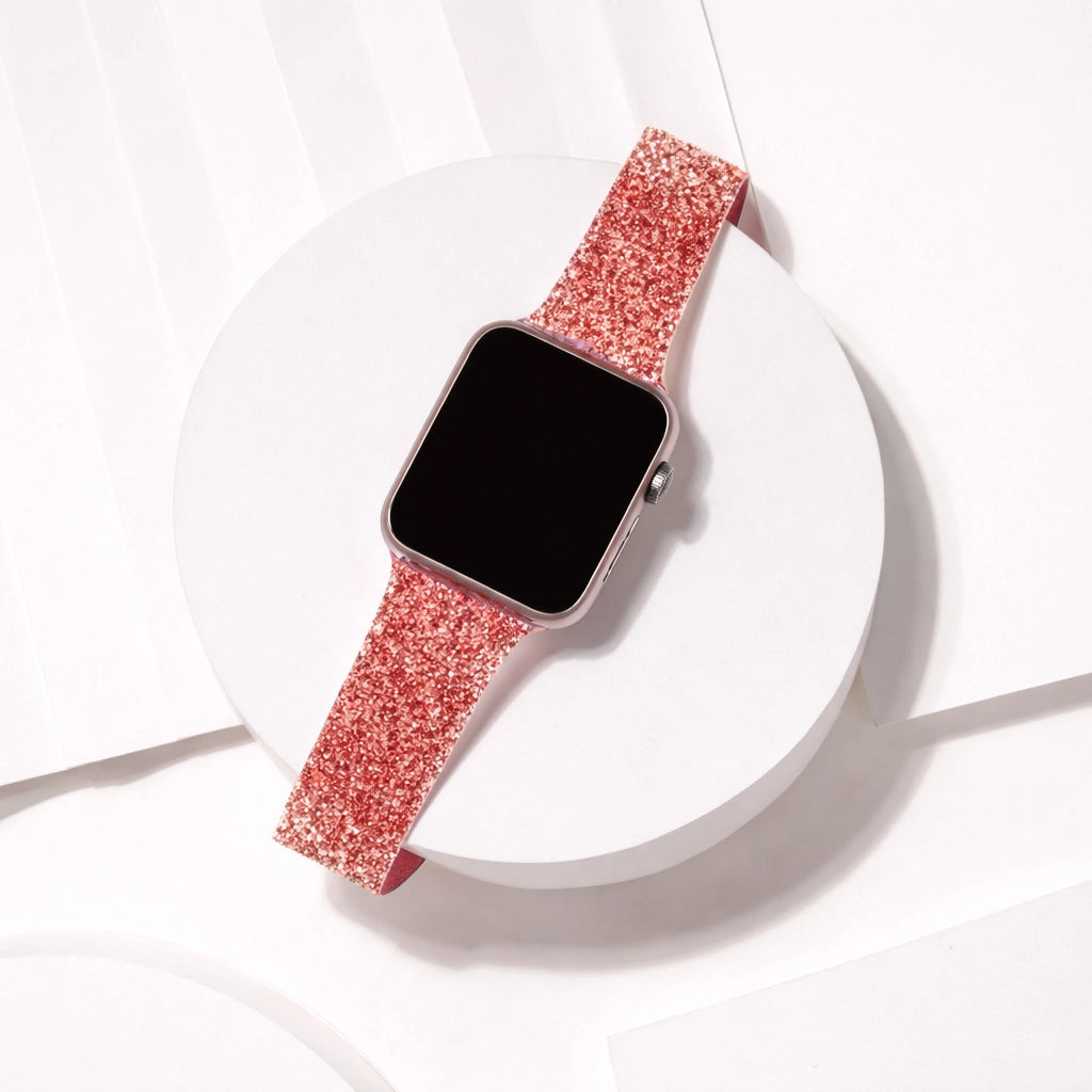 Red glittery Apple Watch band displayed in a clean flat lay with textured sparkle