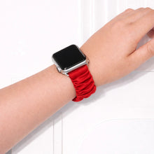 Red scrunchie Apple Watch wristband with stretchy fabric material and gathered design