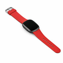 Red silicone watch strap for Fitbit Versa 4 shown flat