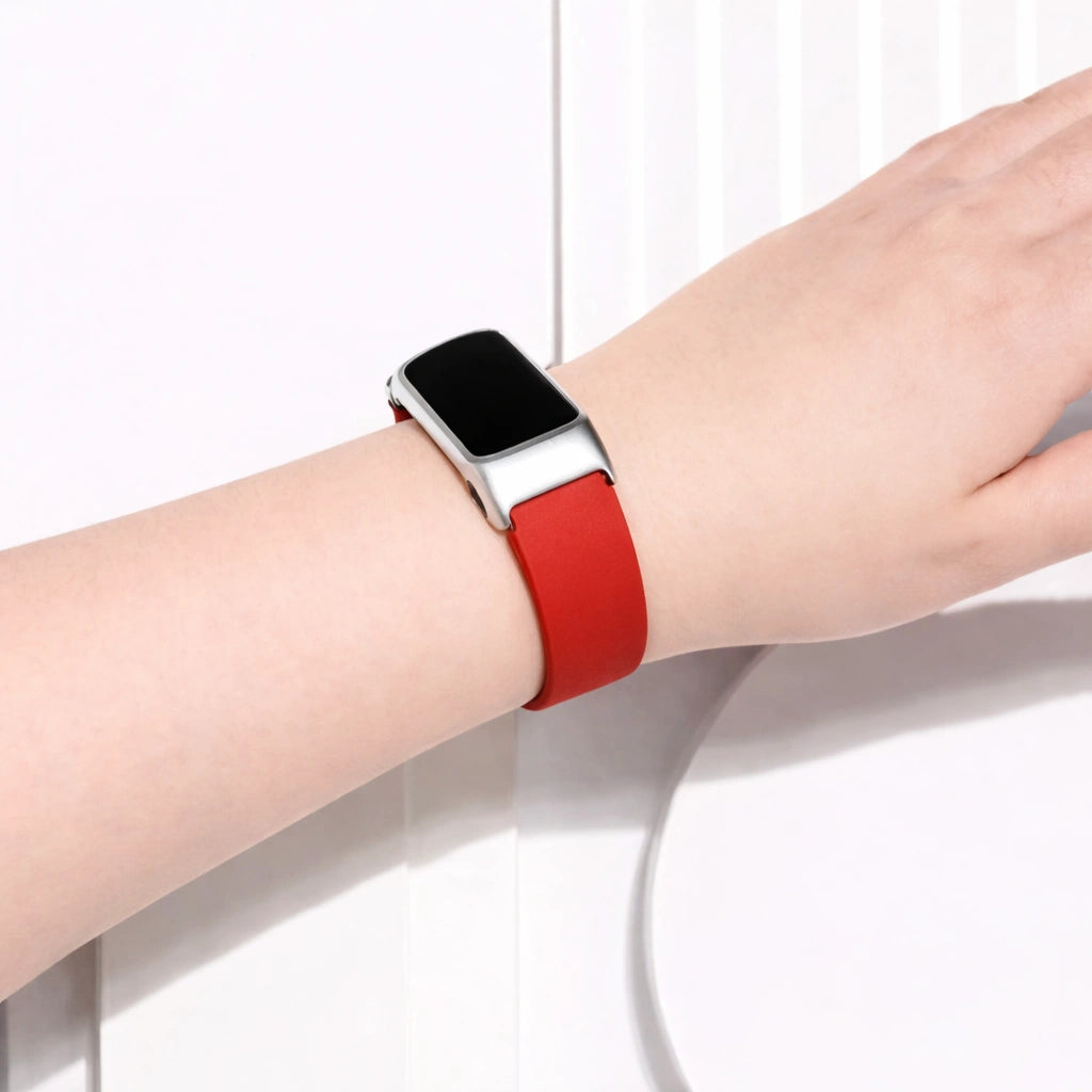 Red watch strap for Fitbit Charge 6 worn on the wrist