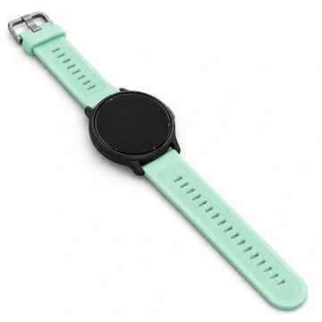 Mint coloured Garmin Fenix strap attached to a black round watch, displayed diagonally on a white background