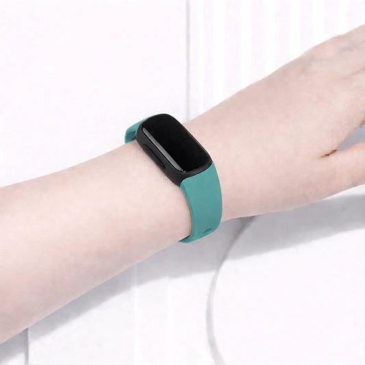Teal watch strap for Fitbit Inspire 3 worn during everyday use